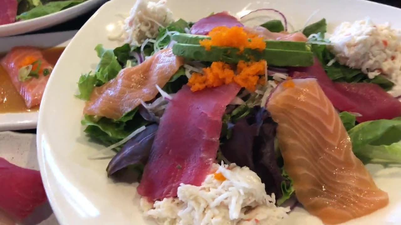 Poke salad with tuna, salmon and crab